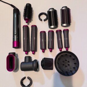 Dyson Air Wrap with additional accessories.